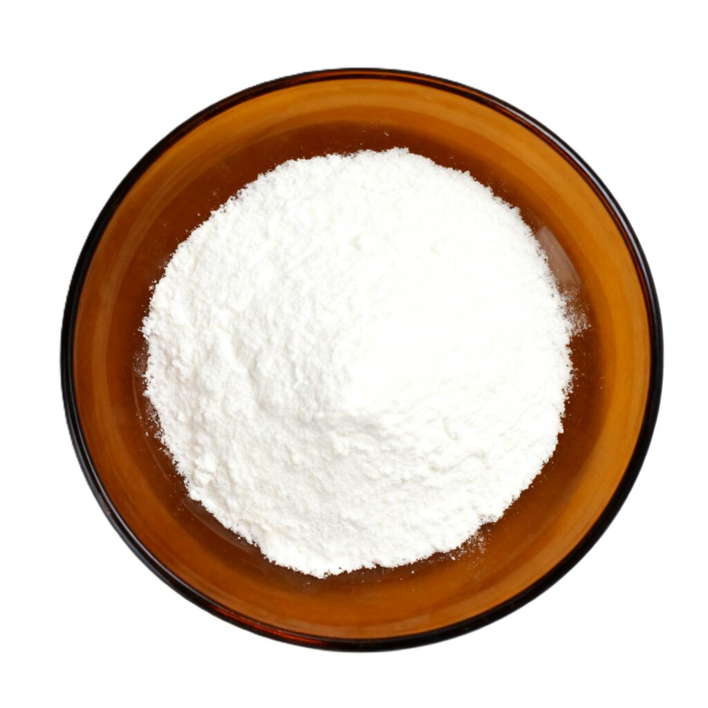 White sodium CMC powder in an amber bowl