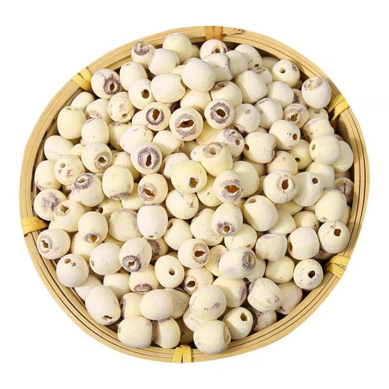 Dried lotus seeds in a bamboo basket